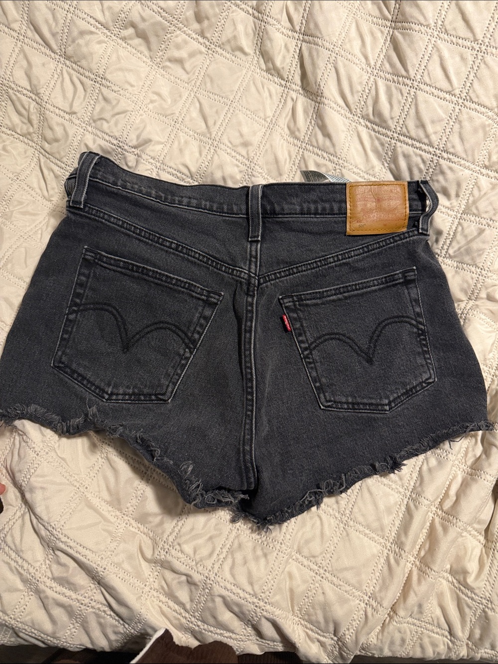 Levi's Washed Black High-Rise Cutoff Jean Shorts